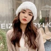 Influencers invierno anti-frío gorra mujer engrosada térmica piel integral sombrero de conejo sombrero de punto versátil details Picture
